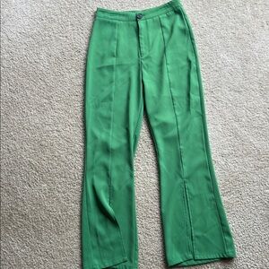 Small green split pants. Never worn
